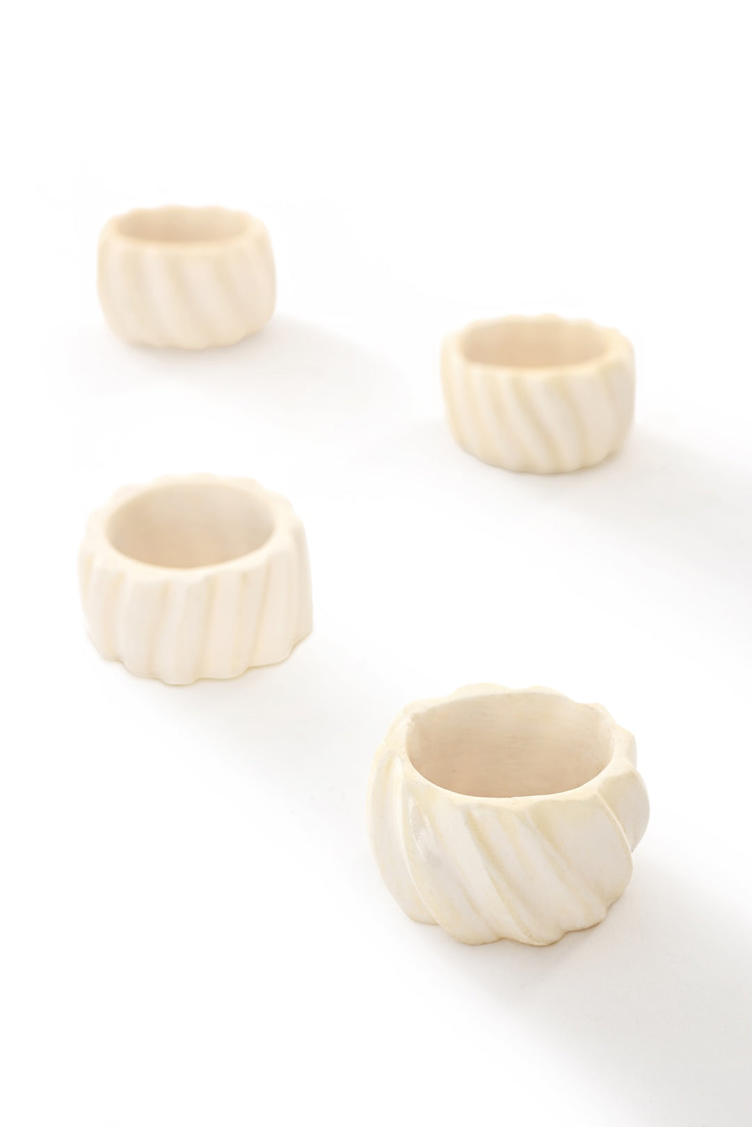 SET OF FOUR Spiral Cow Bone Napkin Rings