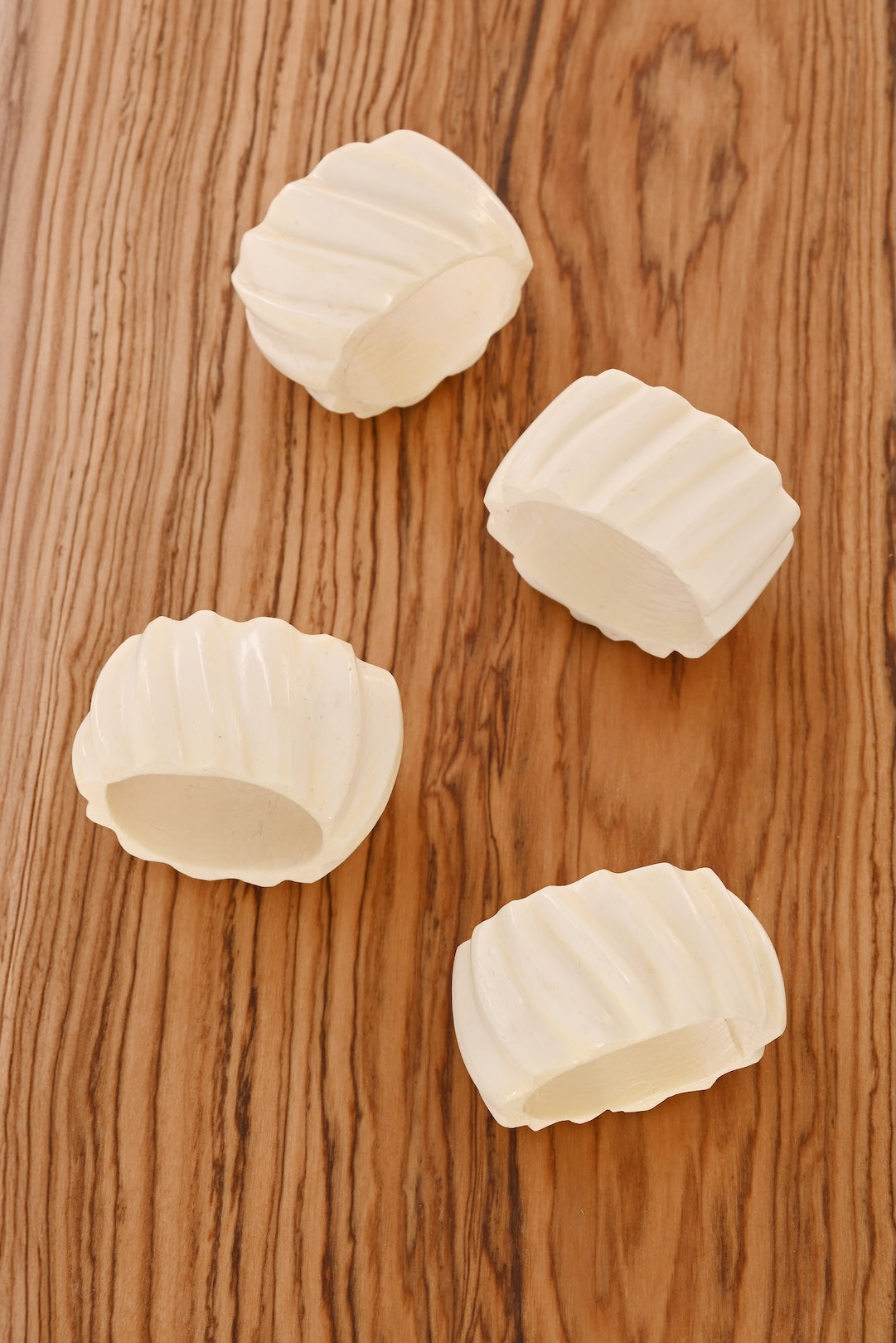 SET OF FOUR Spiral Cow Bone Napkin Rings
