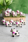 Dozen Miniature Soapstone Cows