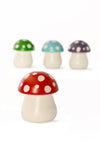 Set of Four Colorful Cartoon Mushroom Sculptures