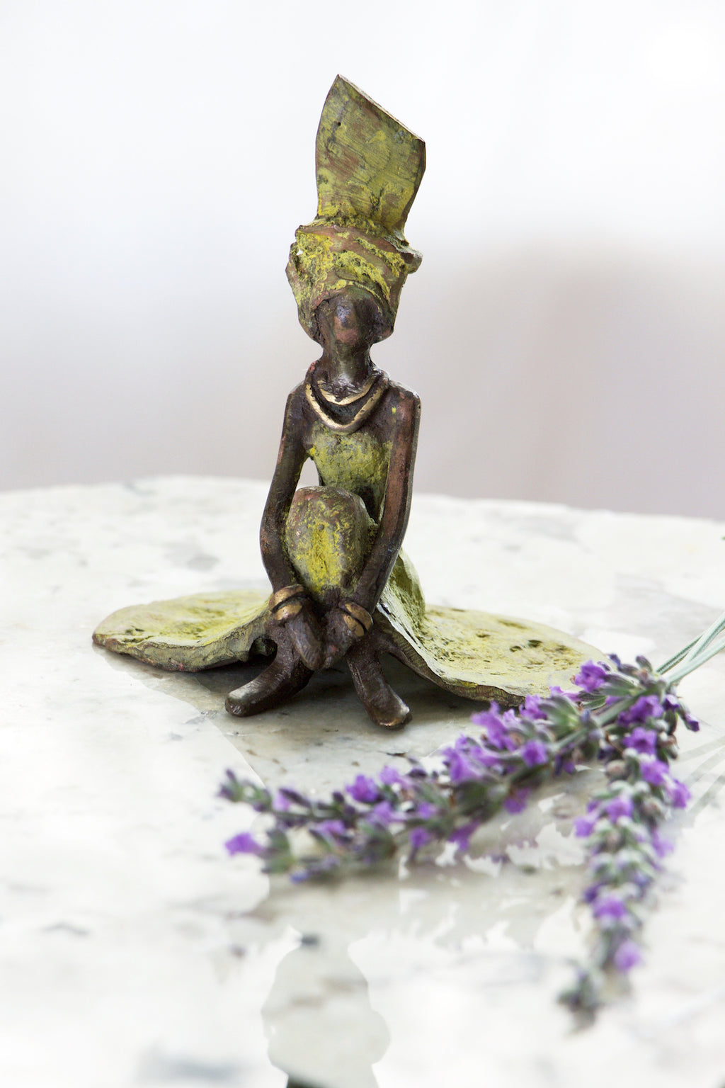 <i>Graciously Waiting</i> Burkina Bronze Sculpture