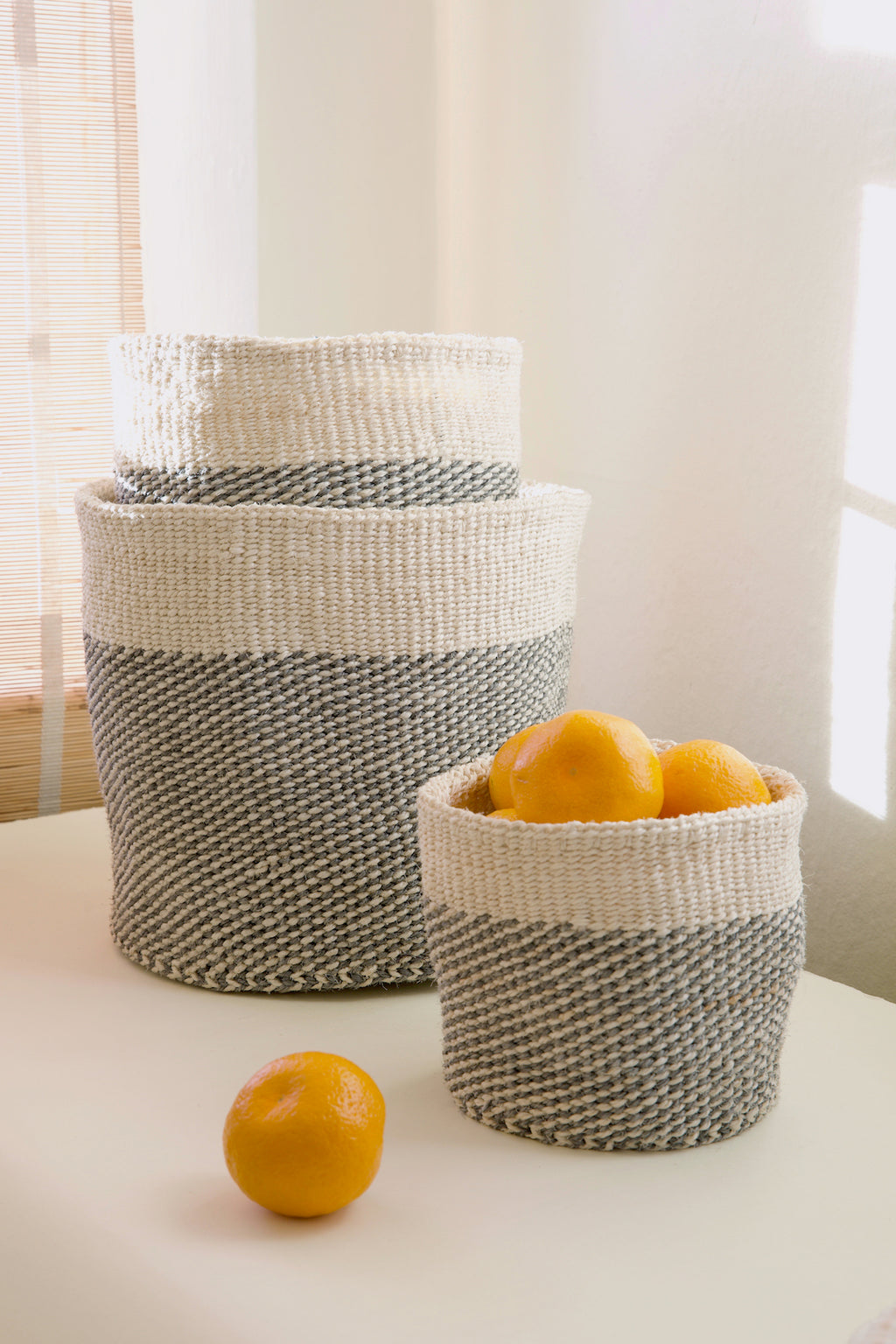 Set of Three Gray and Cream Twill Sisal Nesting Baskets