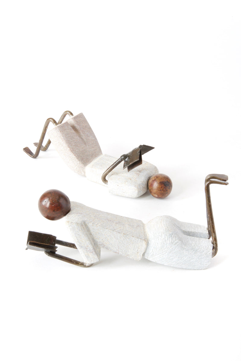 Set of Two Zimbabwean <i>Simple Life</i> Stone and Metal Readers